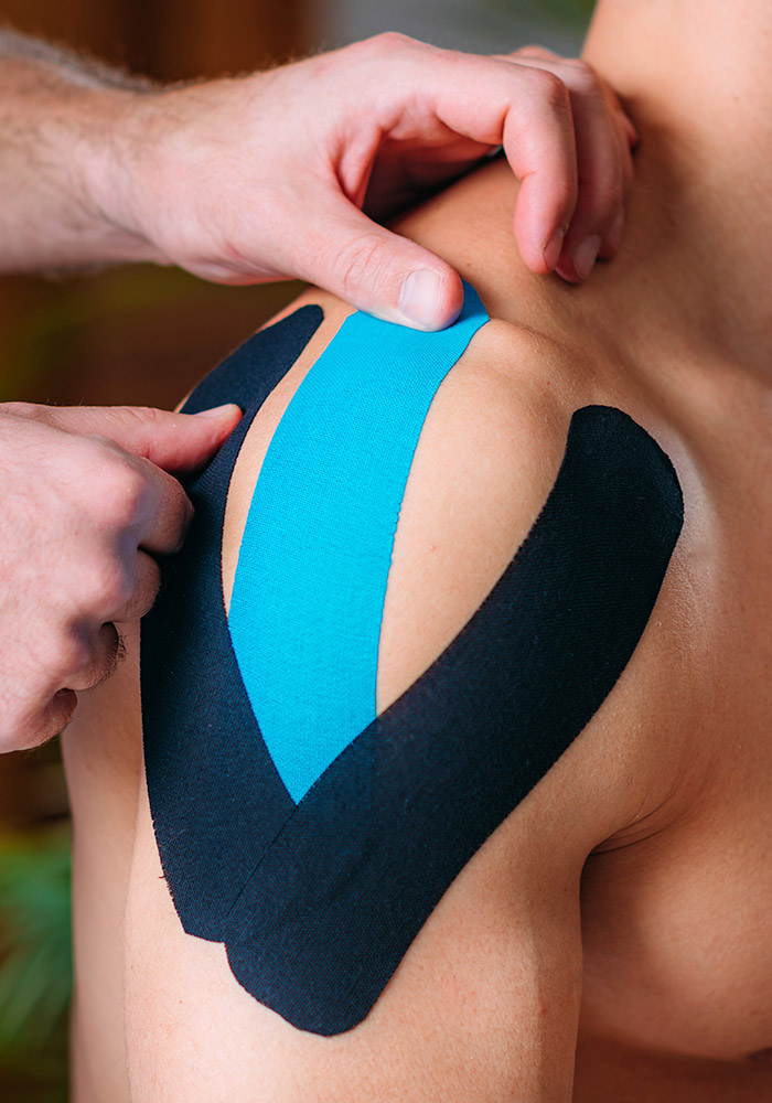 d3 tape being applied to shoulder